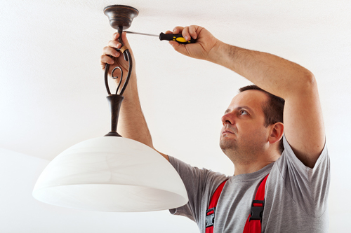 Electrician-Mounting-Ceiling-Lamp